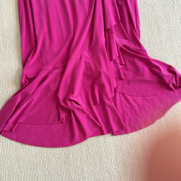 Dress hangs great. Never worn. Ruffles in front and bottom - Picture 4 of 9